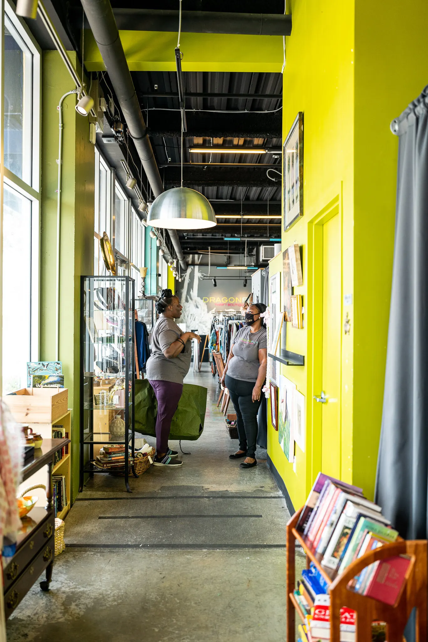 Two community members in conversation on a Good Miami Project assignment